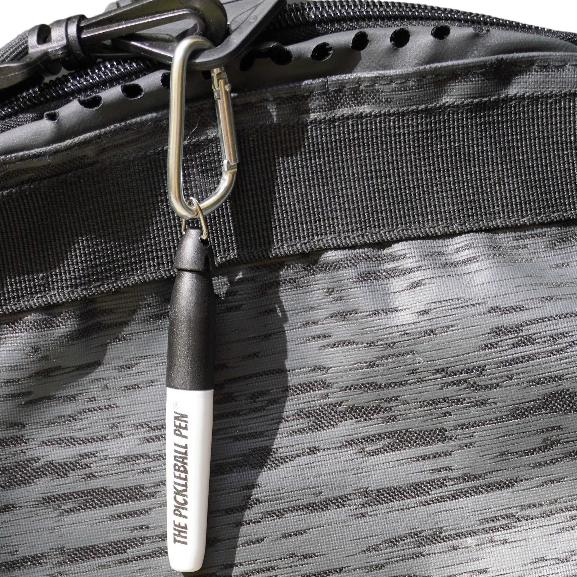 Pickleball Pen marker with hook close up hanging on a tote bag