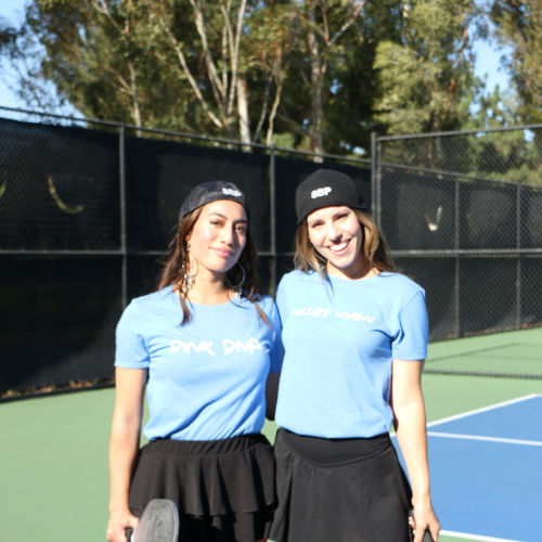 Two Women Wearing Soul Bandit Pickleball BLack Baseball Caps showing SBP on the back